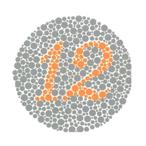 Planche d'Ishihara n° 1 : un nombre en points orange sur un fond de points gris