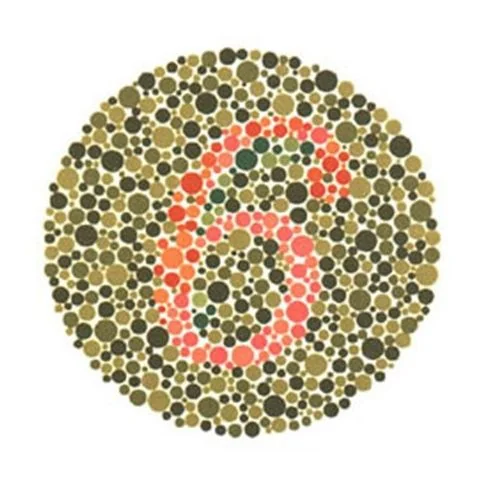 Planche d'Ishihara n° 3 : un chiffre en points rouges et orangés sur un fond de points kaki